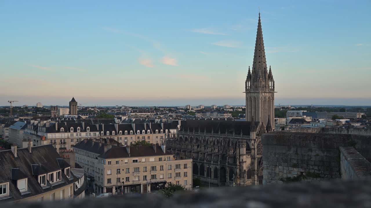 Handheld footage capturing a panoramic view of the city of Caen from the ancient ramparts of the Château de Caen