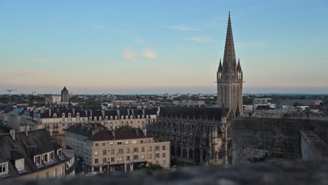 handheld footage capturing a panoramic view of the city of caen from the ancient ramparts of the château de caen