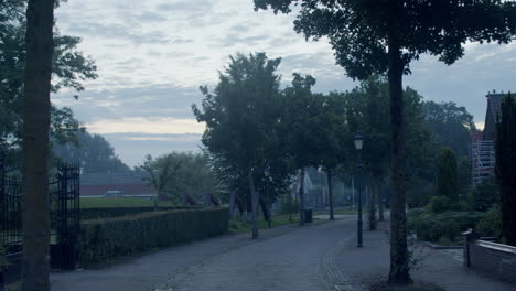 Walking-down-an-empty-street-in-the-early-morning-sunrise