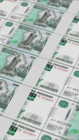 vertical video of 1000 russian ruble banknotes printing by a money press