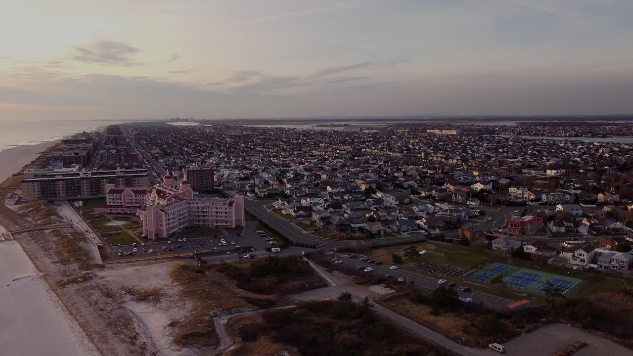 puesta de sol vista aérea de la zona residencial de la playa de lido en long island nueva york