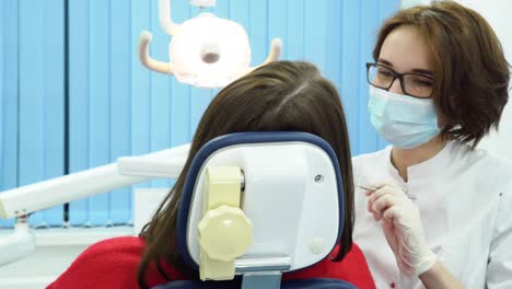 dentist examining patient