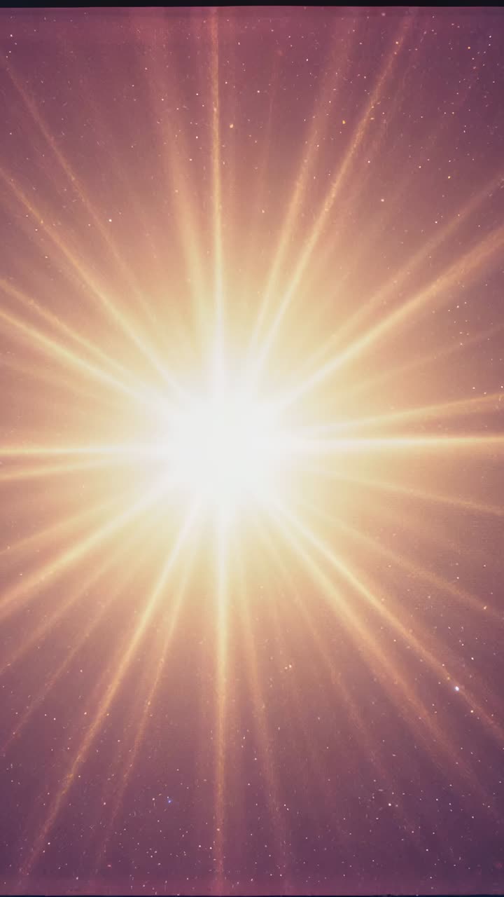 Vertical video: Playback starting showing shining central flare casting rays in space scene, film