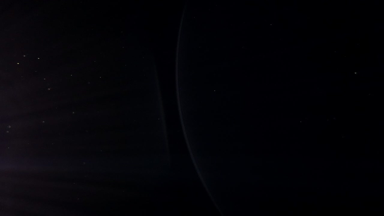 Slow Motion Dust Particles On Black Backlit