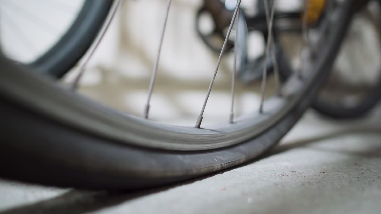 Load being applied to a flat bicycle tire