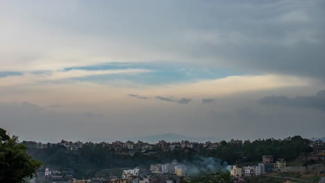 storm clouds in the sky rolling into the night time-lapse.