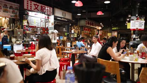 diners enjoy meals in a vibrant restaurant