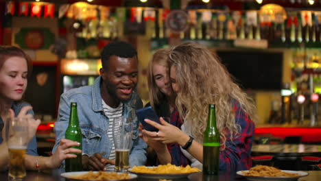 Young-joyful-people-taking-selfie-with-black-smartphone-snapping-pictures-for-sweet-memories-concept-of-everyday-life-with-gadgets.