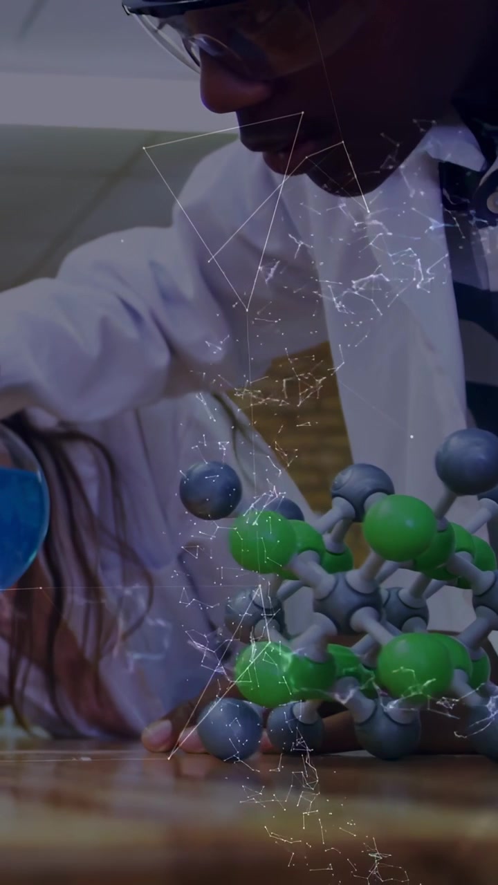 Vertical video: Student reaching molecular model in lab, activating animated web showing molecule
