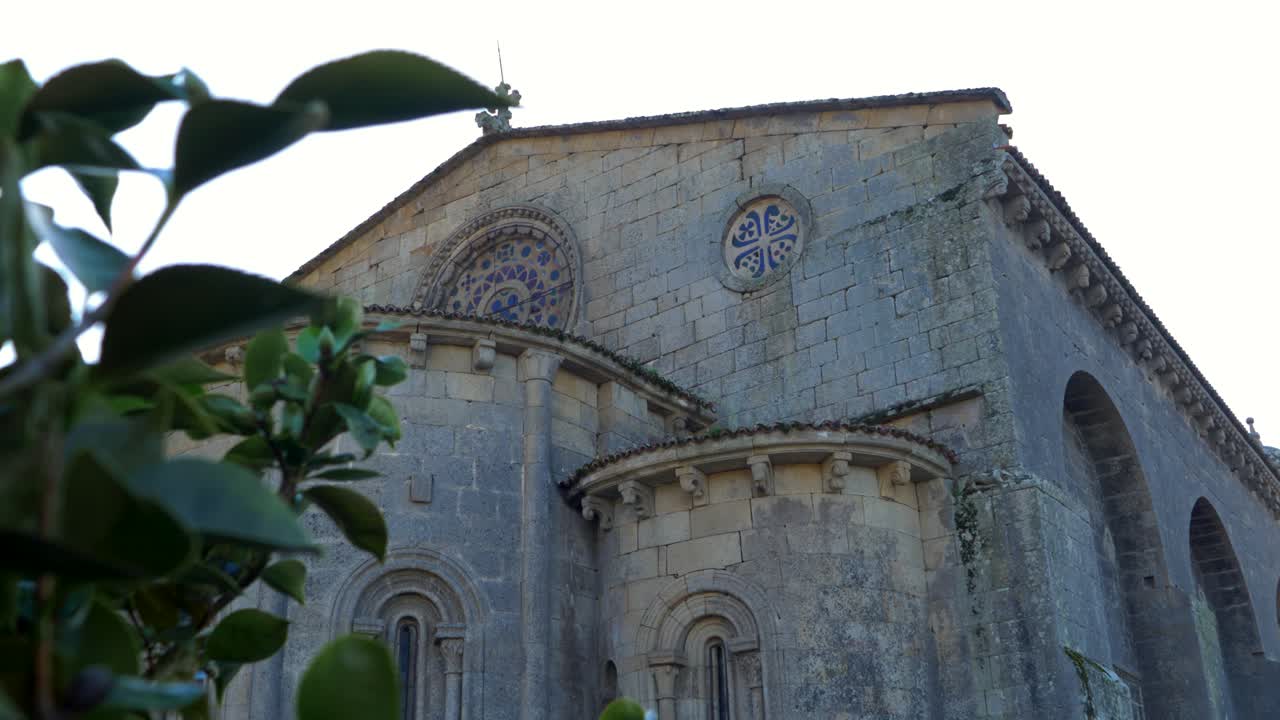 Close-up of the stonework of the Church of Santa Mariña in Allariz, focusing on its architectural details and ancient design