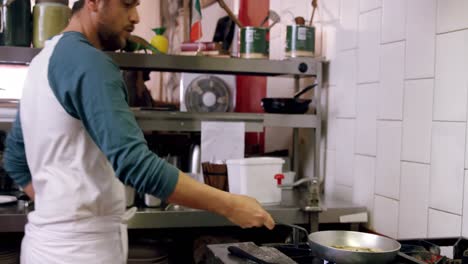 male baker preparing pasta in bakery shop 4k