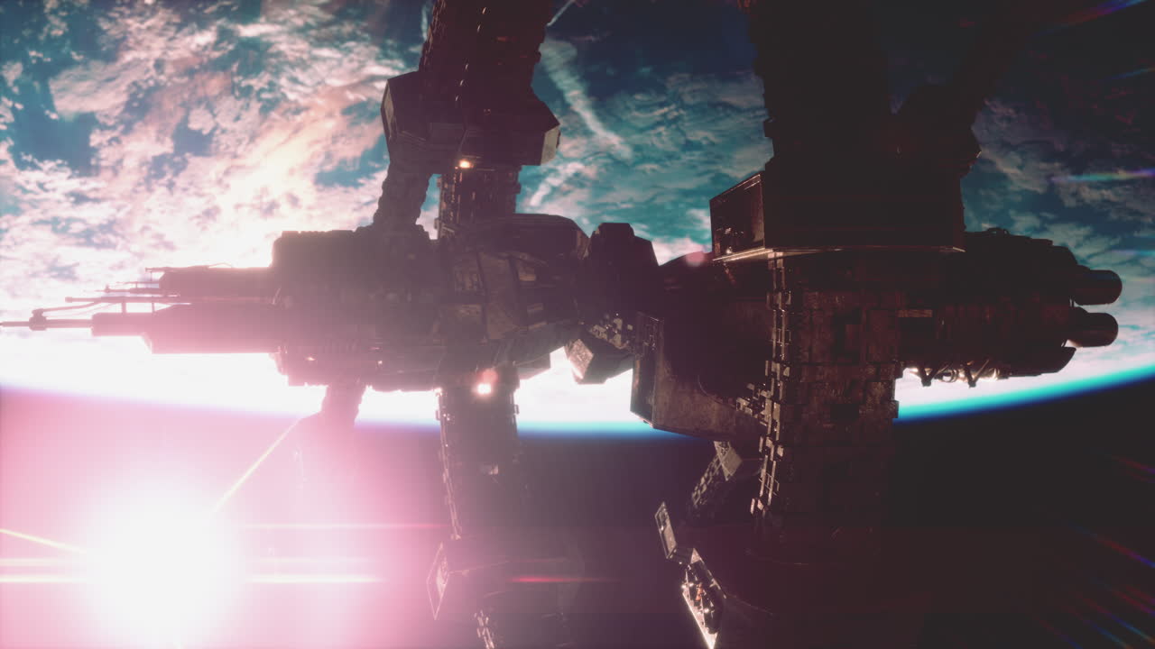 Un vaisseau-mère extraterrestre près de la Terre, des éléments fournis par la NASA.