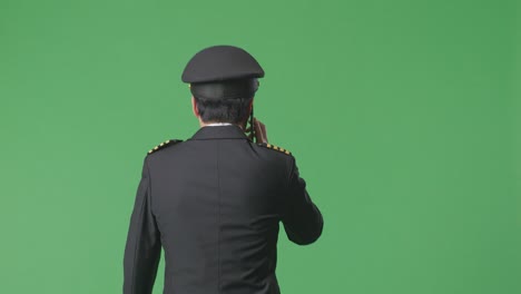 pilot talking on phone - green screen