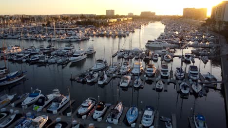 Beautiful-drone-shot-yachts-at-Marina-Del-Rey-in-Los-Angeles-at-sunset