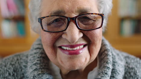 Happy-senior-woman,-smile-and-wisdom-with-glasses