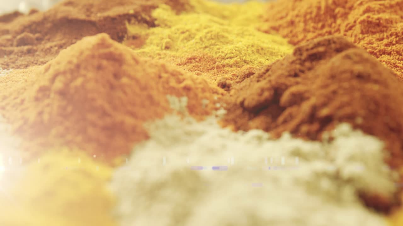 Animation of light spots over colourful powder