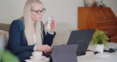 Businesswoman-Doing-Home-Office-Work-On-Laptop-Computer-Woman-Writing-Email-On-Laptop-5