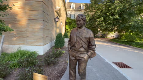 phillip seymor hoffman statue at the eastman kodak company and helped to bring the photographic use of roll film into the mainstream