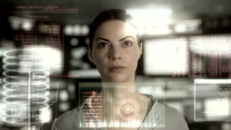 woman analyzing data in a high tech workplace.