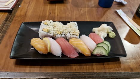 Fresh-sashimi-combo-showcasing-a-variety-of-raw-fish-slices