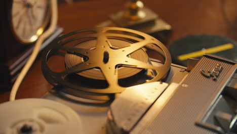 reel to reel tape spinning on desk