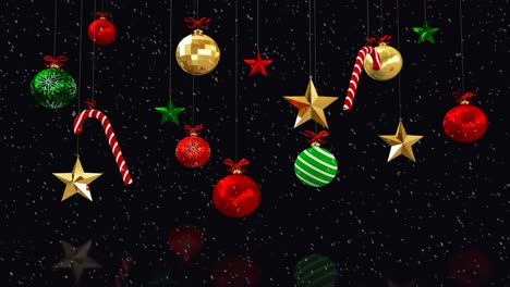animación de decoraciones de navidad y bolas con nieve cayendo