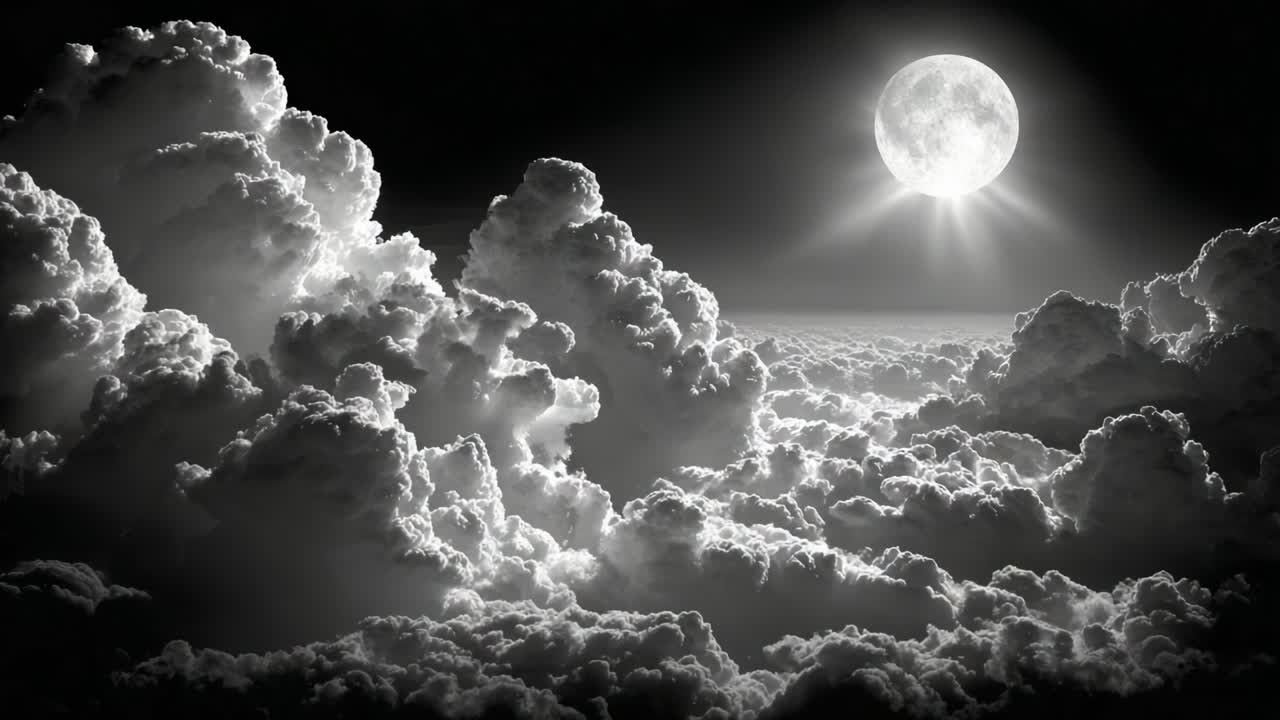 A Captivating View of a Radiant Full Moon Surrounded by Majestic Clouds in a Dark Sky, Illuminating the Night with a Beautiful Silver Glow