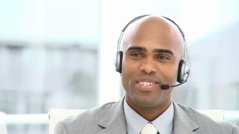 confident businessman with headset on