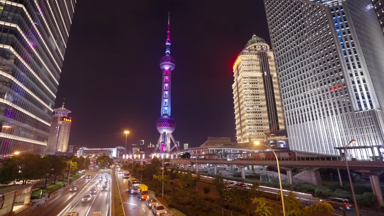 At night, the lights of high-rise buildings in Shanghai are on