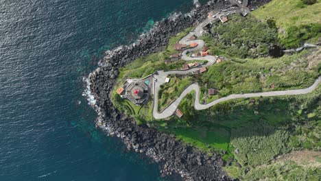 farol ponta do arnel lighthouse on sao miguel coastline