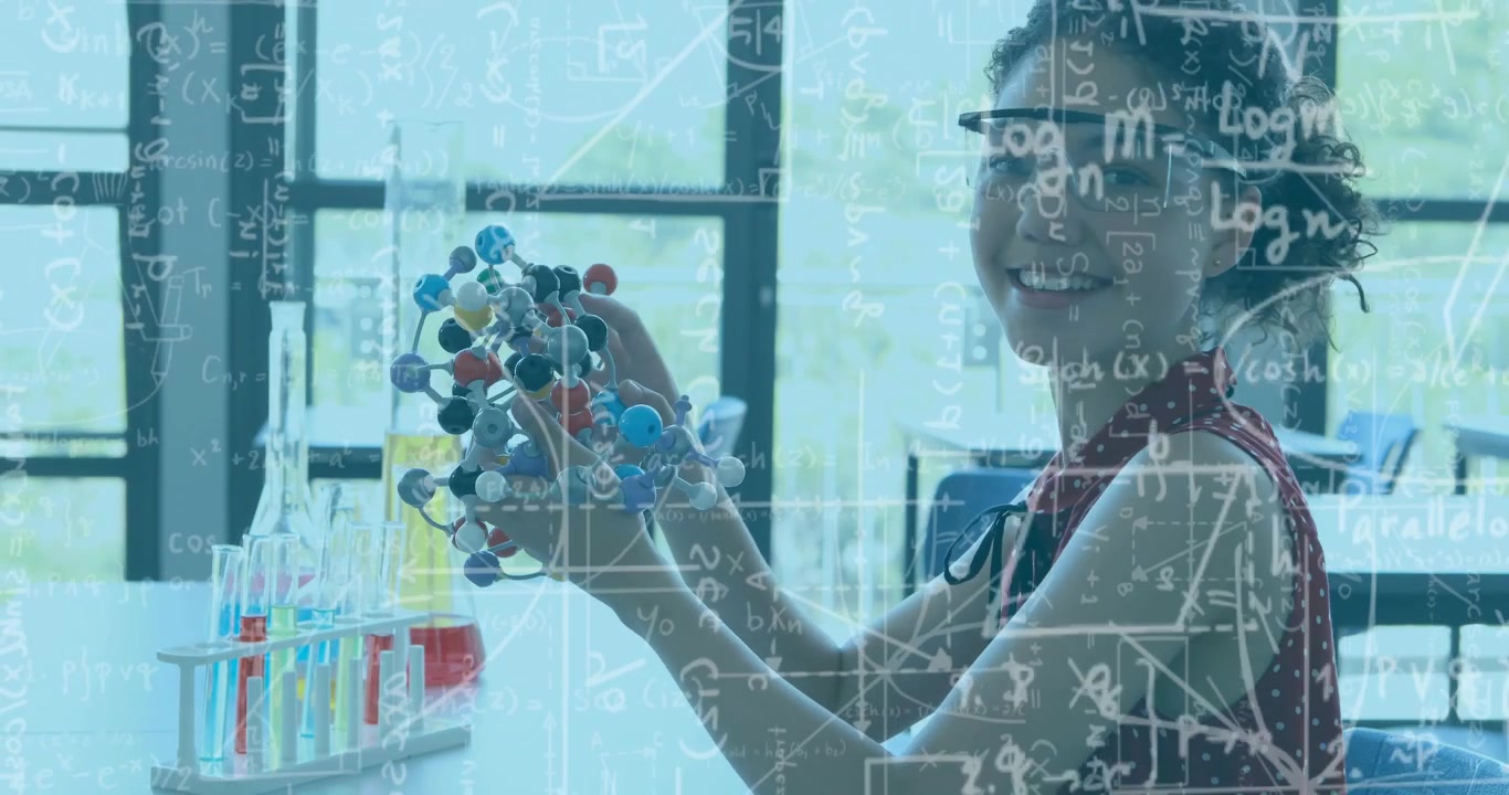 Teen student lifting and rotating molecular model at lab table, studying bonds with formula overlay