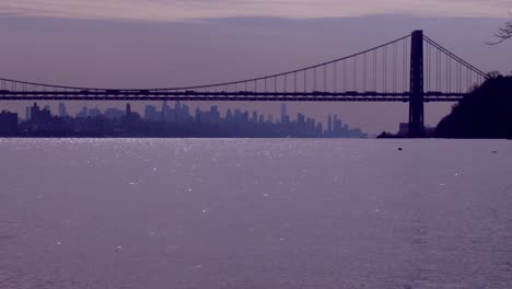 the george washington bridge connects new jersey to new york state with the manhattan skyline 1