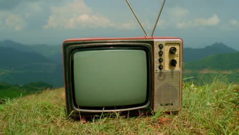 old cathode-ray tube television set played in its final resting place for a funeral