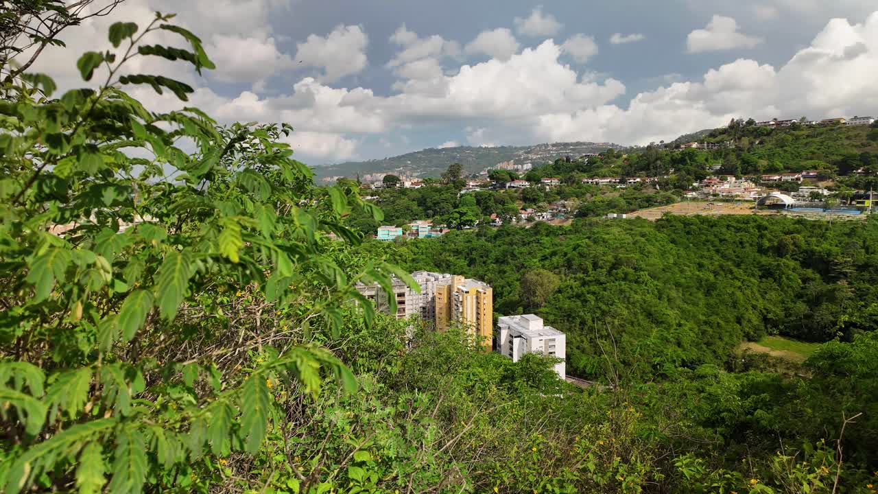 Panoramic view to the left, view of the city of Caracas from the La Fila mountain viewpoint. Venezuela