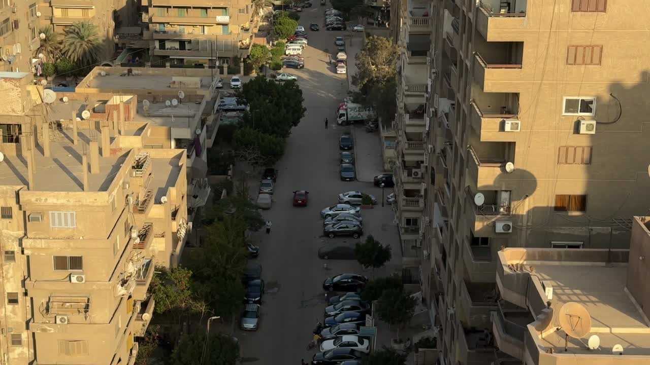 A view of a city from a roof on high way, trucking shot