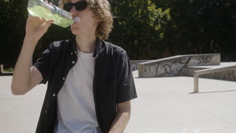 caucasian boy in skatepark.