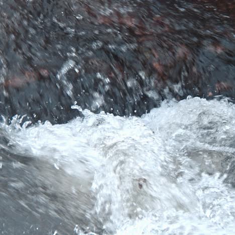 white mountain stream water falling down