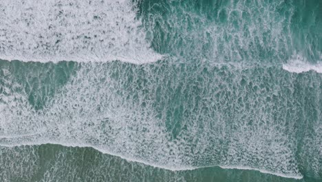 Top-View-Of-Foamy-Waves-On-The-Empty-Tropical-Beach-In-Razo,-La-Coruna,-Spain