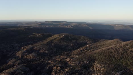 aerial shot of rocky plateau during sunrise on a clear day