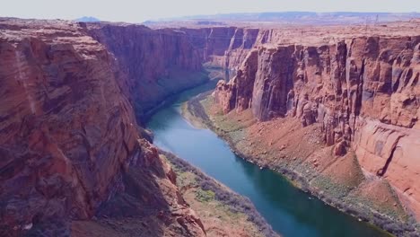 aerial shot of a river running through a canyon