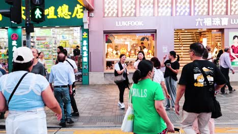 crowded street scene with diverse pedestrians