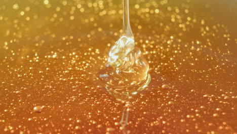 golden honey dripping close-up