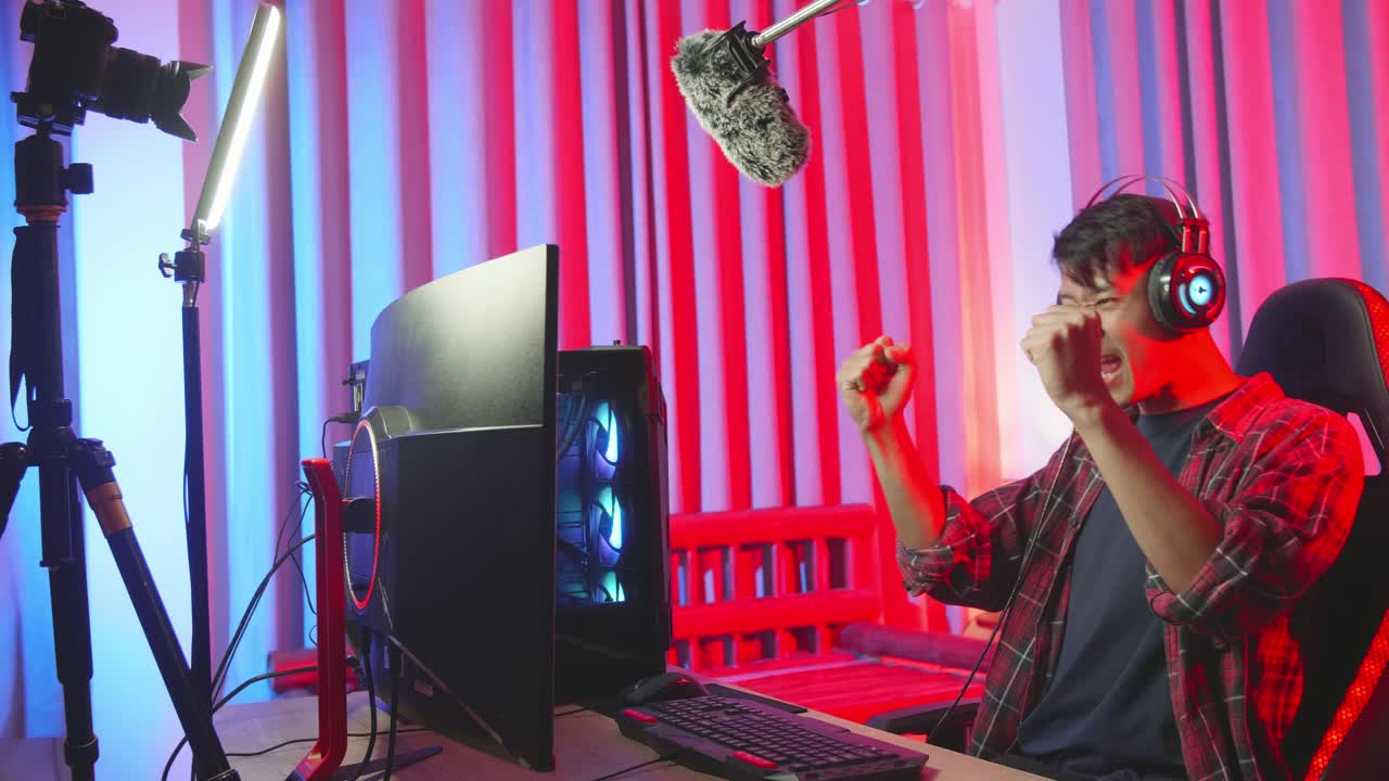 Excited Gamer Celebrating a Win in a Live Stream