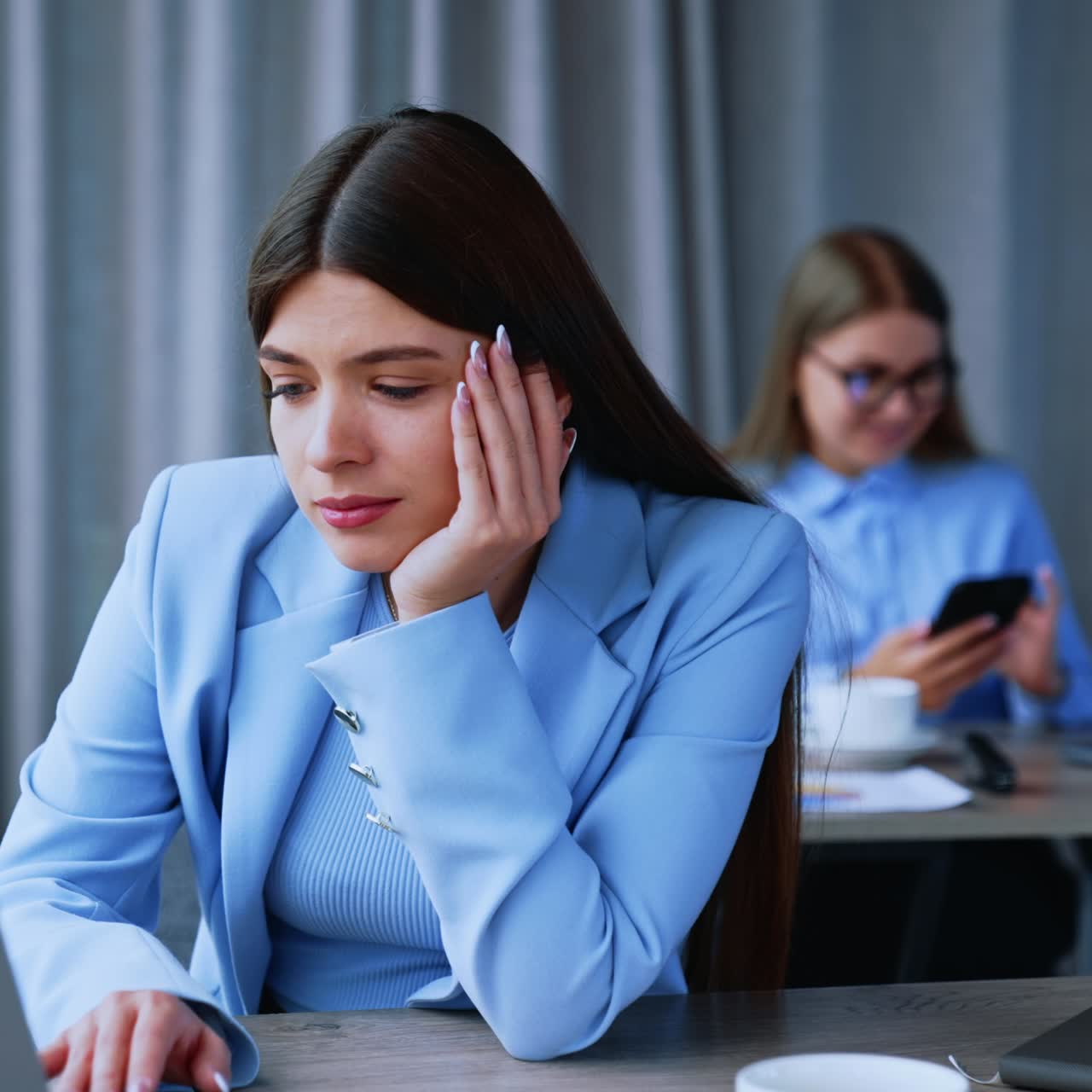 Beautiful business manager working with computer. Succesfull young businesswoman with laptop
