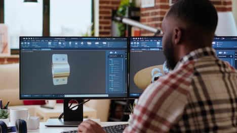 Un-Diseñador-Afroamericano-Utiliza-Herramientas-De-Modelado-3D-Y-Software-CAD.