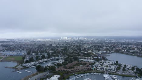 Beautiful-cloudy-skies-over-a-large-city-near-the-bay