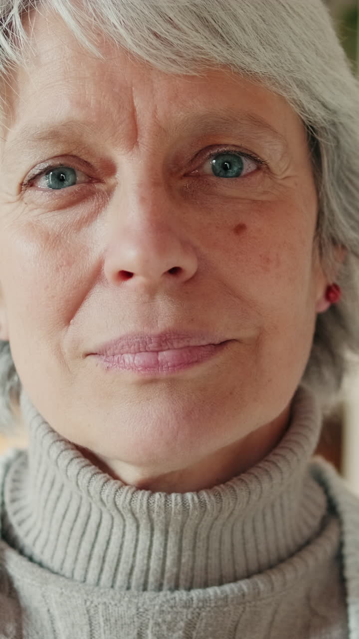 Close-up Portrait of a Happy Senior Woman Smiling