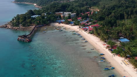 paradise beach turquoise water perhentian island malaysia costal rocks drone