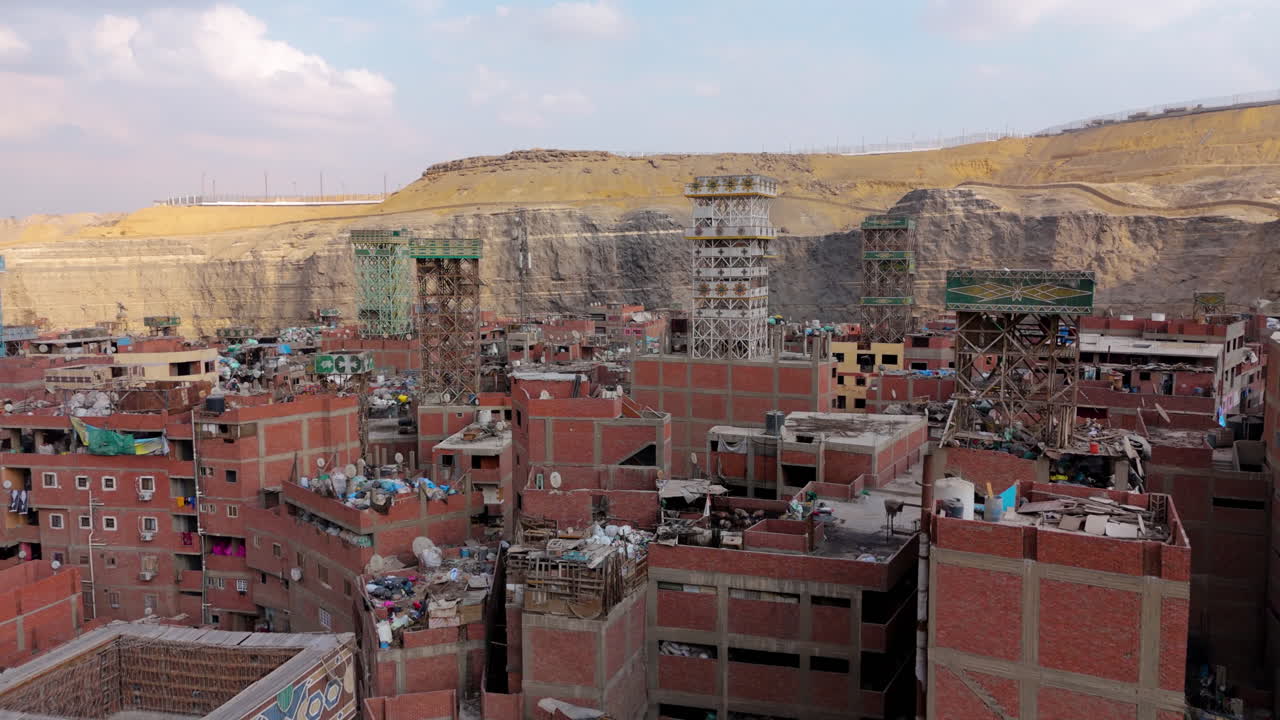 Workers sorting waste in Garbage City from above