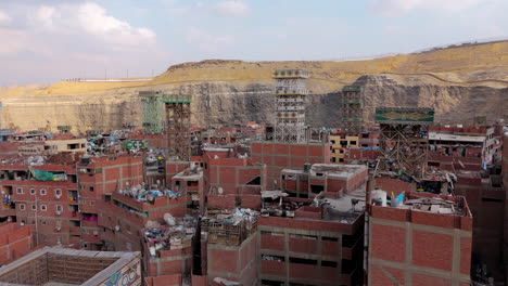 workers sorting waste in garbage city from above